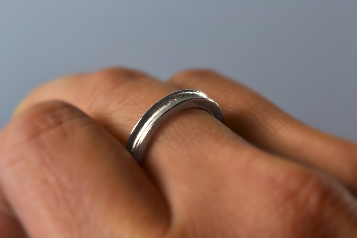 Sterling scoop band on hand