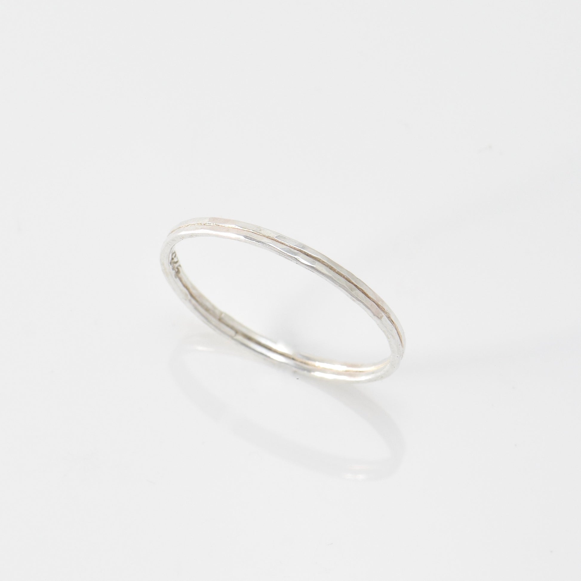Two thin sterling bands together with lightly hammered texture