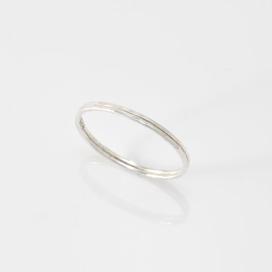Two thin sterling bands together with lightly hammered texture