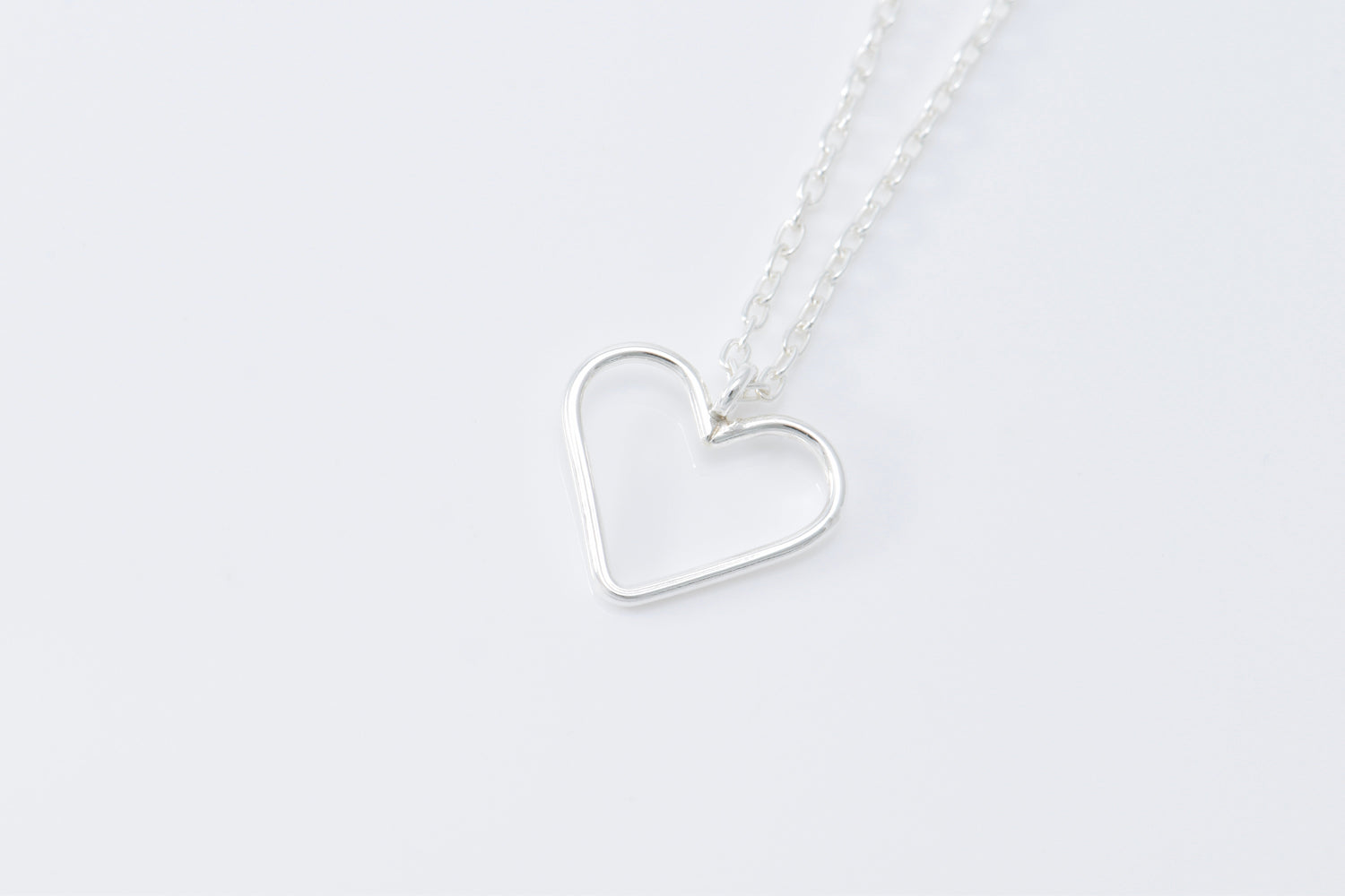 Single sterling silver wire heart pendant on sterling silver cable chain