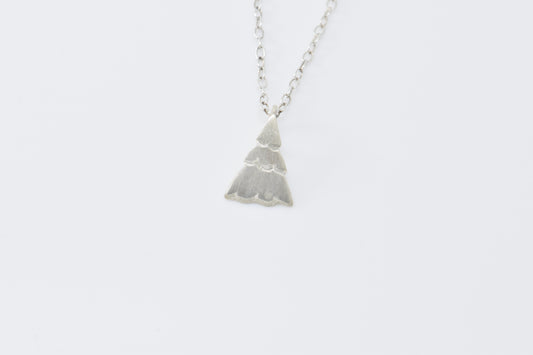 Small Christmas tree pendant on cable chain with white background